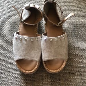 Grey studded platforms